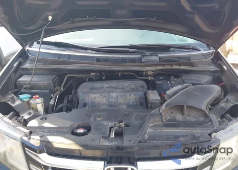 2014 Honda Odyssey Ex-L z USA, uszkodzony, nr VIN 5FNRL5H63EB068452